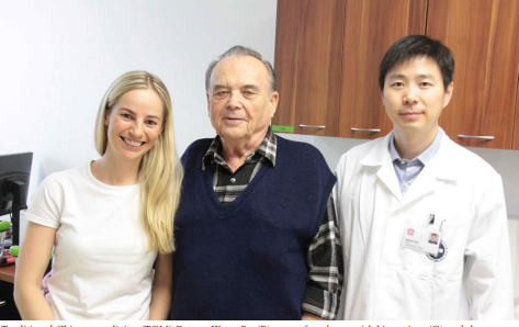 Traditional Chinese medicine (TCM) Doctor Wang Bo (R) poses for photos with his patient (C) and the translator at the research center for TCM in Hradec Kralove, the Czech Republic, March 2, 2016. As a concrete result of closer cooperation between China and Central and Eastern Europe (CEE) in recent years, the research center for TCM, officially opened on June 17, 2015, serves as a manifest for the expansion of areas of China-CEE pragmatic cooperation. [file photo]