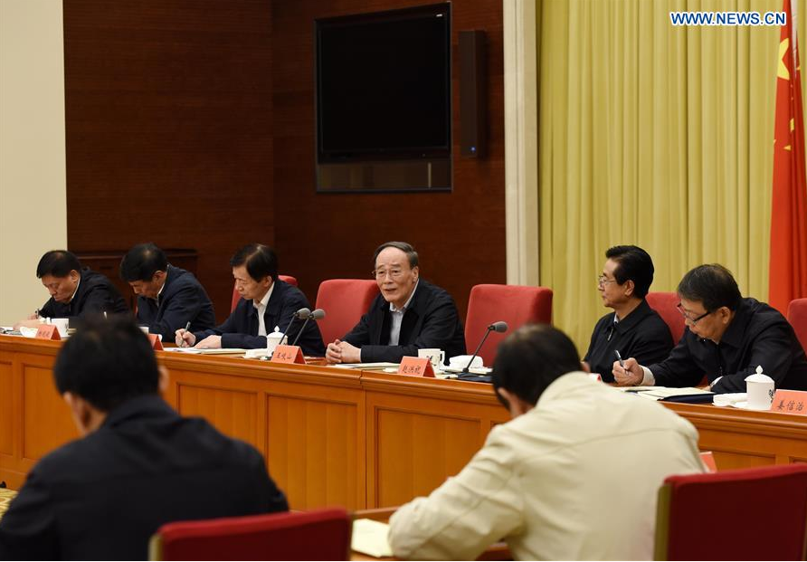 Wang Qishan (3rd R, rear), secretary of the Communist Party of China Central Commission for Discipline Inspection, attends a symposium on anti-corruption inspections in Beijing, capital of China, Sept. 28, 2016. (Xinhua/Rao Aimin)
