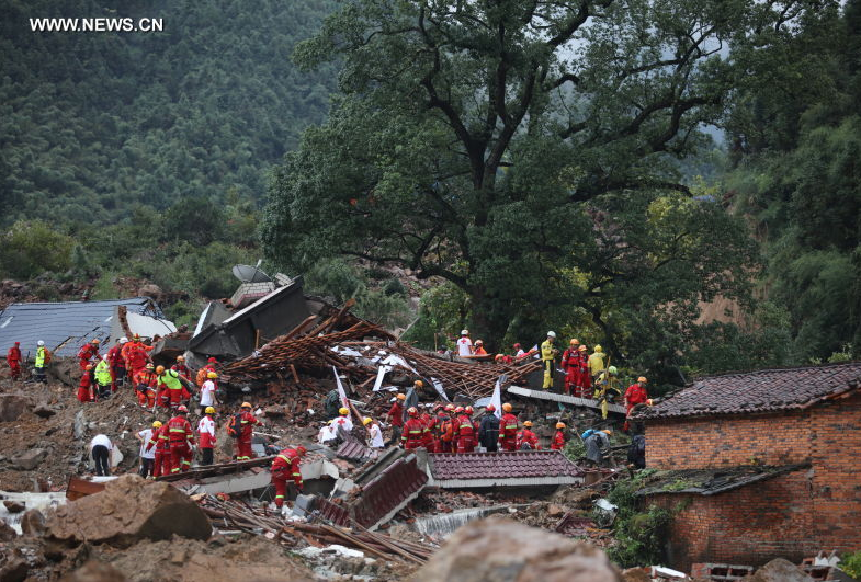 Rescuers work at the accident site after a landslide hit Suichang County, east China's Zhejiang Province, Sept. 29, 2016.[Photo/Xinhua] 