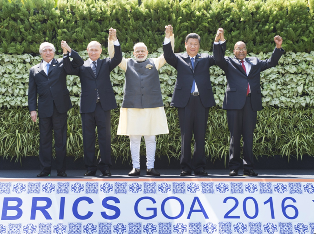 Brazilian President Michel Temer, Russian President Vladimir Putin, Indian Prime Minister Narendra Modi, Chinese President Xi Jinping and South African President Jacob Zuma (from L to R) pose for a group photo at the eighth BRICS summit in the western Indian state of Goa, Oct. 16.
