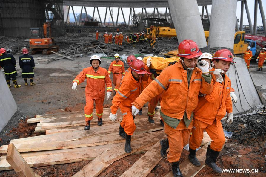 Rescuers work at the accident site at the Fengcheng power plant in Yichun City, east China's Jiangxi Province, Nov. 24, 2016.[Photo/Xinhua]