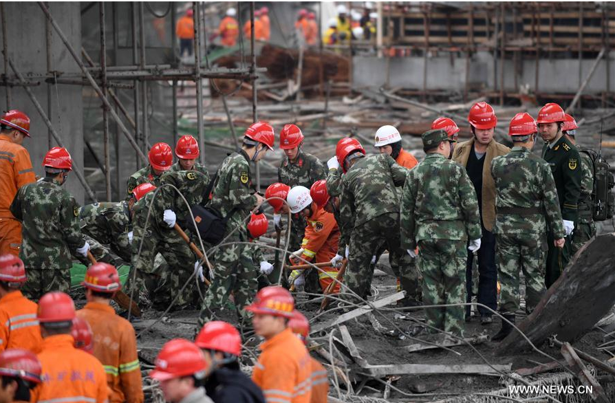 Rescuers work at the accident site at the Fengcheng power plant in Yichun City, east China's Jiangxi Province, Nov. 24, 2016.[Photo/Xinhua] 