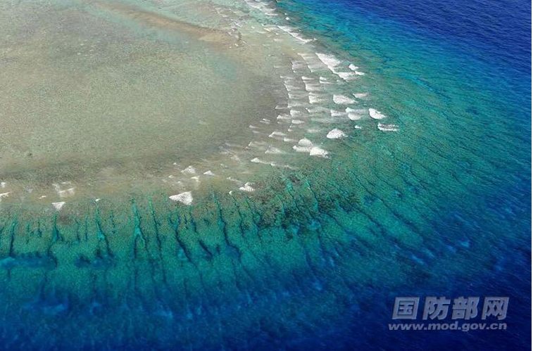 An aerial photo of a reef in the South China Sea. [Photo / MOD] 