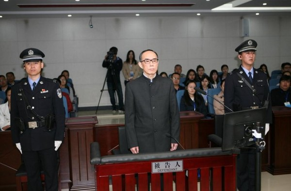 Chang Xiaobing, former chairman of China Telecom, stands trial for accepting bribes on April 18. [Photo/CCTV]