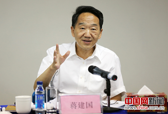 Jiang Jianguo, vice minister of the Publicity Department of the Central Committee of the Communist Party of China and minister of the State Council Information Office, addresses the seminar on a China.org.cn program in Beijing on July 18. [Photo/China.org.cn]