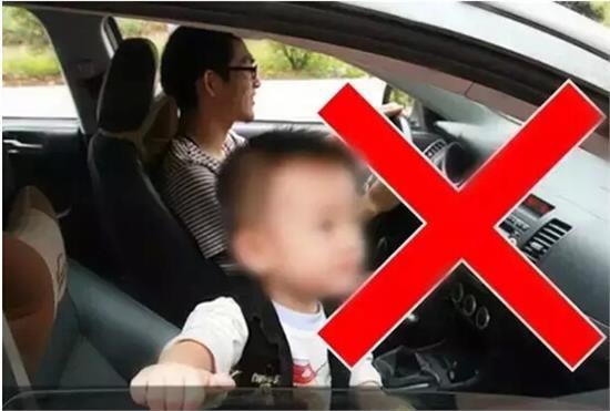 Is it against the law to clearance have a child in the front seat