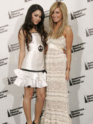 Actors Vanessa Hudgens L and Ashley Tisdale pose backstage at the 2006 