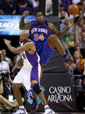 Phoenix Suns' Steve Nash is guarded by New York Knicks' Nate
