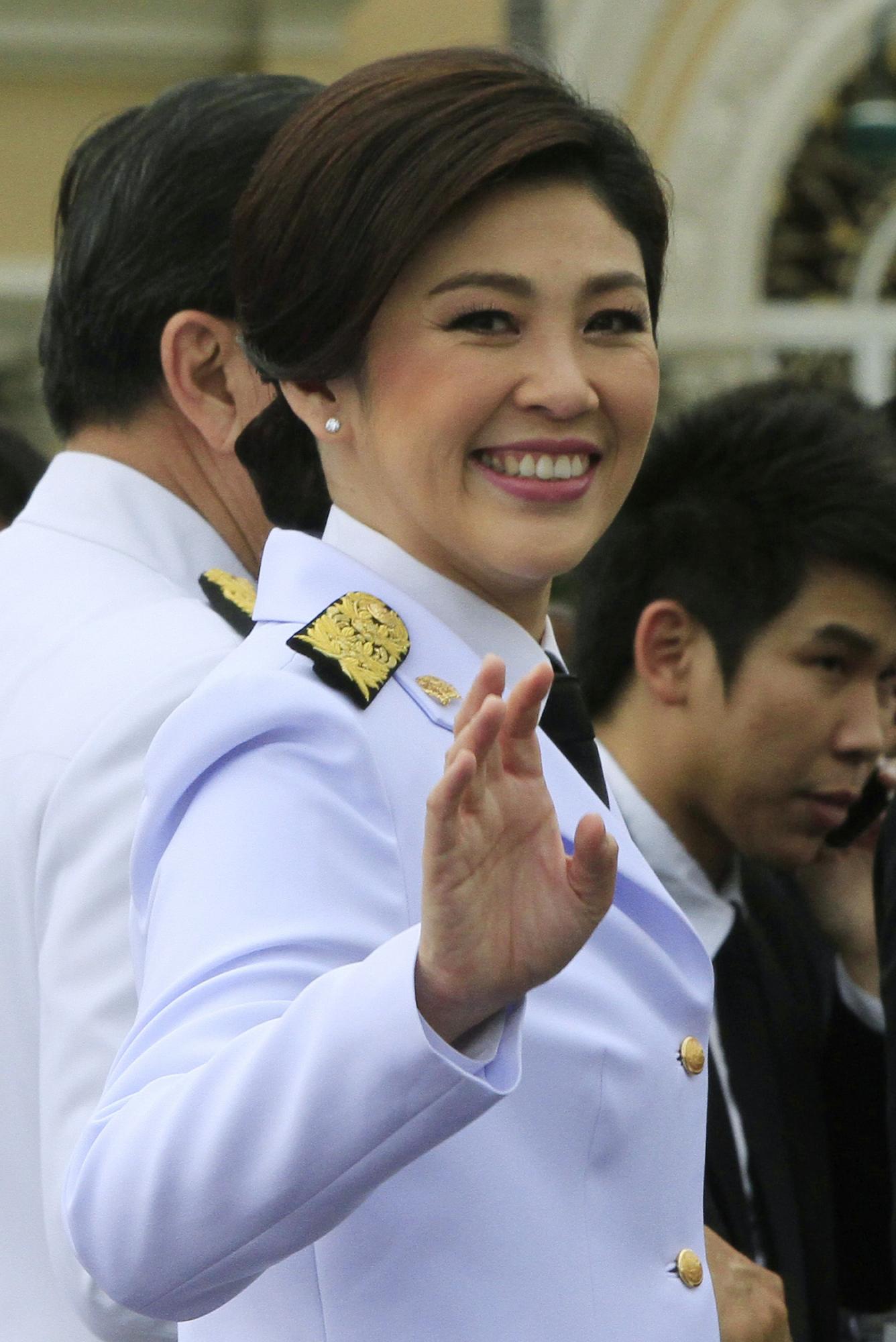泰国女总统英拉图片_泰国总统英拉儿子图片_泰国总统英拉身材图片