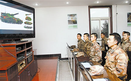 内部组成…3月21日上午,在兰州军区某炮兵团自行榴弹炮营理论学习室