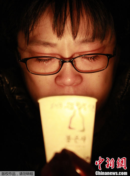 韩国高考冲刺阶段 学生家长点烛光为子女祈愿