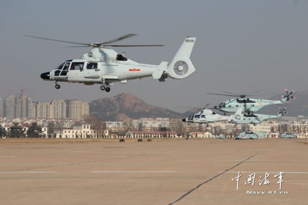 中国海军首支舰载机部队直8直9群新年首飞