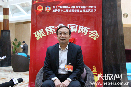 全国政协委员杨玉成:鼓励重点县率先甩掉贫困