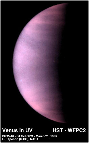 这是哈勃望远镜拍摄的金星被部分云雾遮挡的照片。（国际在线独家资讯 付华一）