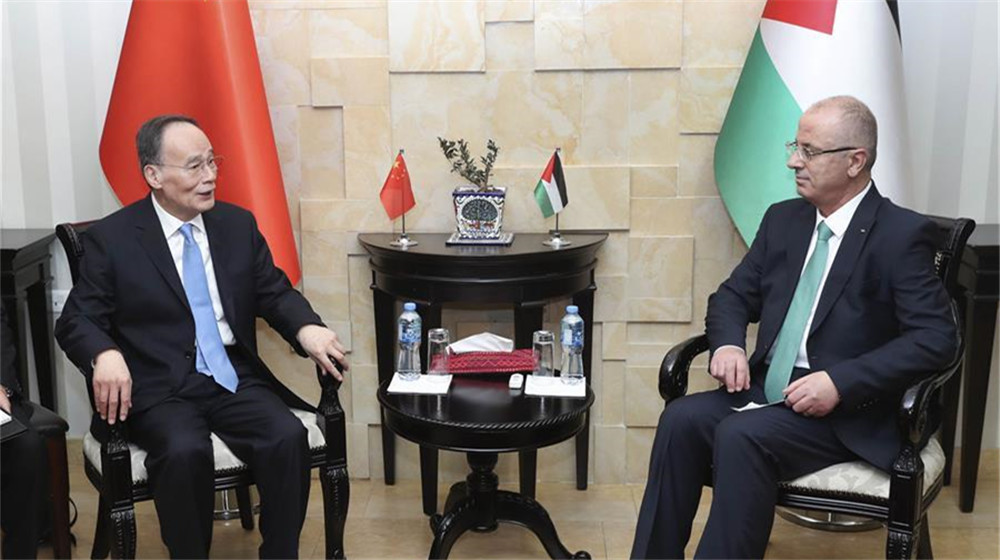 王岐山会见巴勒斯坦总理哈姆达拉