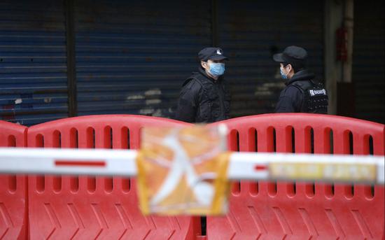 武汉封城背后确认病毒人传人的21天