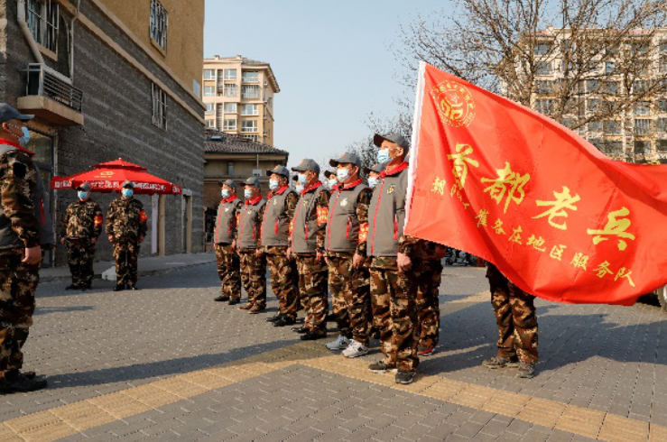 老兵"志愿者服务队就是其中的一支队伍代表,他们是由20名退役军人组成