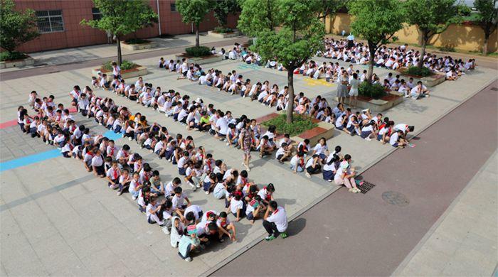 庐江县城西小学开展918防空应急疏散演练