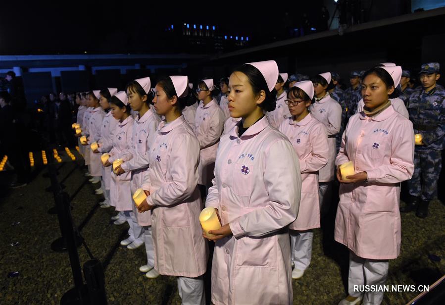 Панихида со свечами по жертвам Нанкинской резни