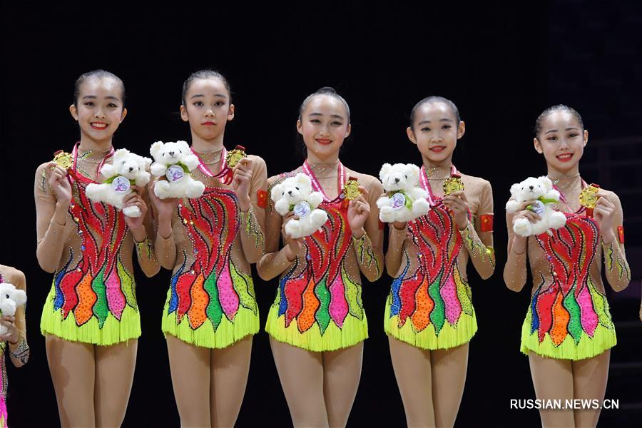 Команда Китая выиграла золотые медали в сегодняшних групповых соревнованиях с булавами среди юниорок на проходящем в столице Малайзии чемпионате Азии по художественной гимнастике 2018 года. 