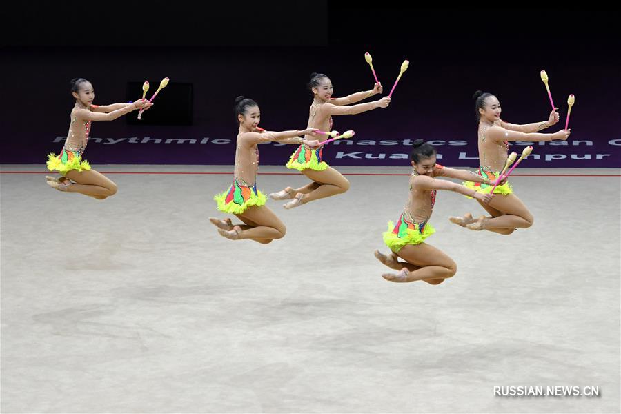 Команда Китая выиграла золотые медали в сегодняшних групповых соревнованиях с булавами среди юниорок на проходящем в столице Малайзии чемпионате Азии по художественной гимнастике 2018 года. 