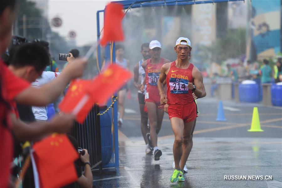 18-е Азиатские игры -- Легкая атлетика, спортивная ходьба: китайские скороходы выиграли золото и бронзу на дистанции 20 км