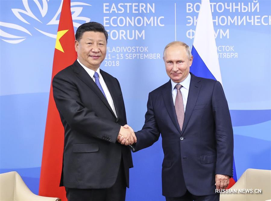 Си Цзиньпин провел переговоры с президентом РФ В. Путиным
