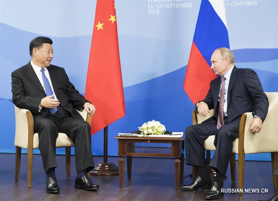 Си Цзиньпин провел переговоры с президентом РФ В. Путиным