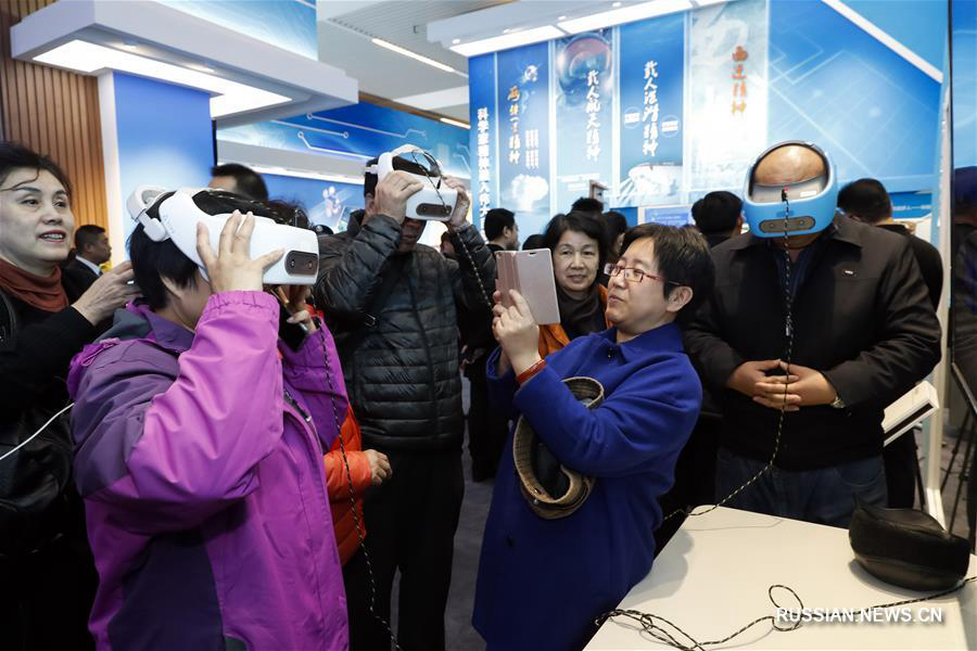 На выставке в честь 40-летия политики реформ и открытости использованы современные интерактивные технологии
