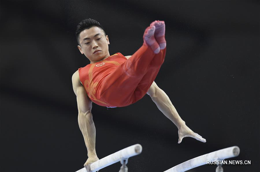 Спортивная гимнастика -- Кубок мира 2019, этап в Катаре: Цзоу Цзинъюань завовевал золото в упражнениях на брусьях 