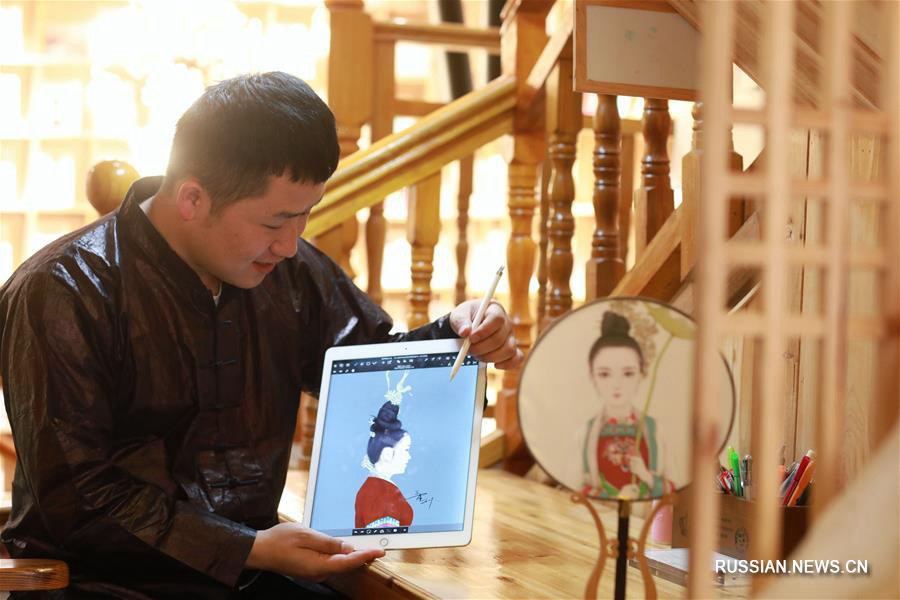 Молодой иллюстратор из провинции Гуйчжоу -- хранитель народной культуры 