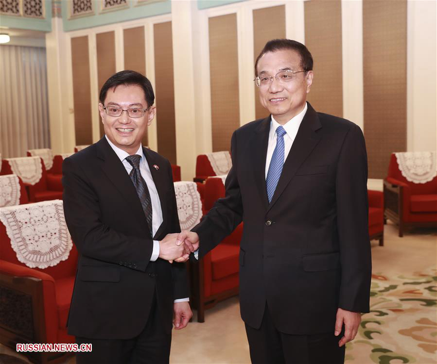 Премьер Госсовета КНР Ли Кэцян встретился с заместителем премьер-министра Сингапура