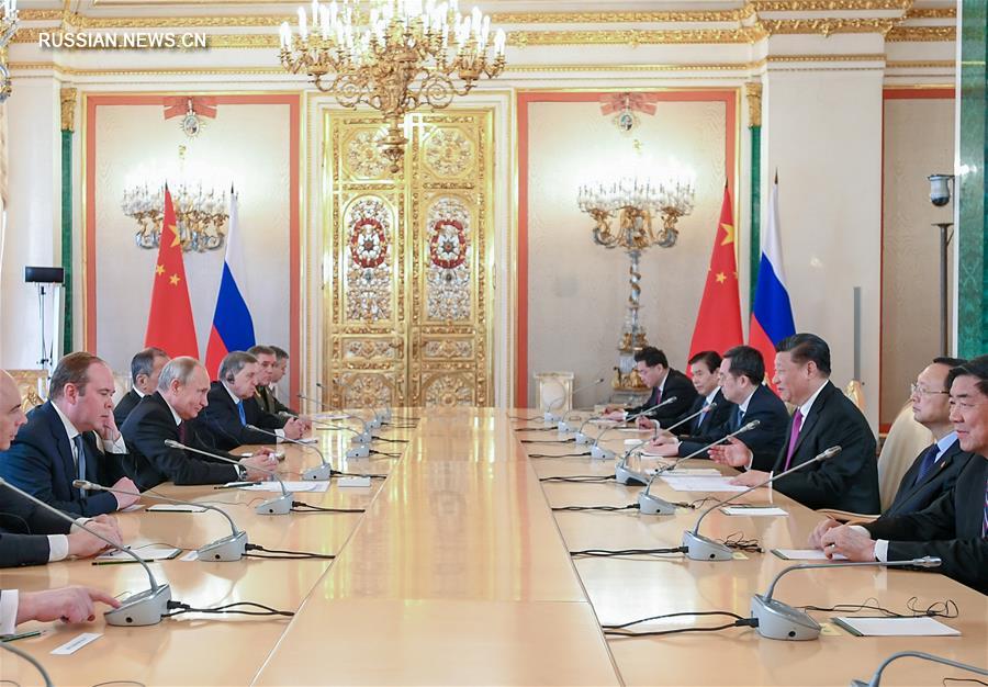 Си Цзиньпин и В. Путин провели переговоры и объявили о развитии китайско-российских всесторонних отношений стратегического взаимодействия и партнерства в новую эпоху 