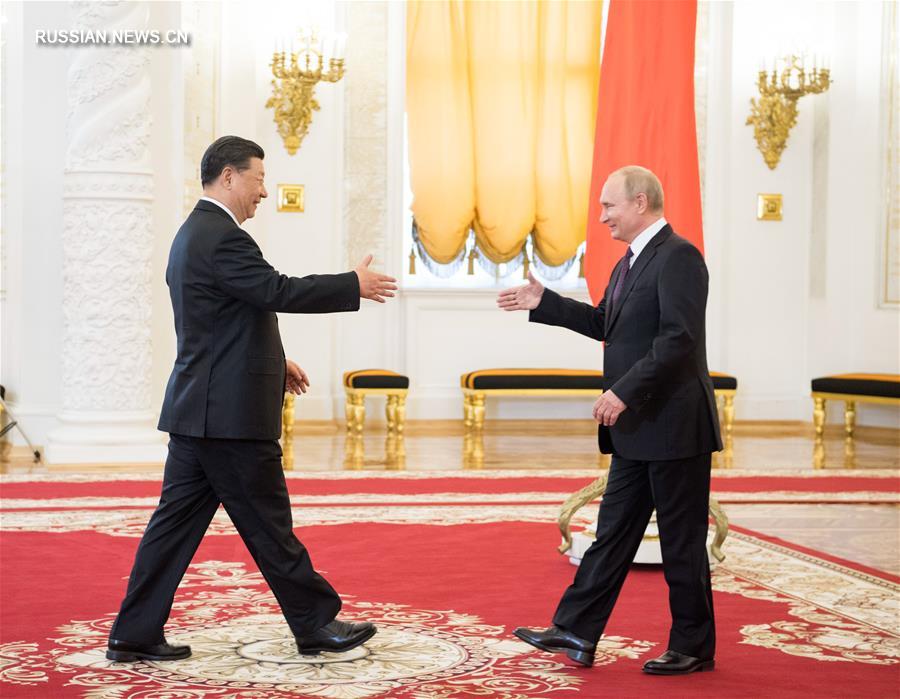 Си Цзиньпин и В. Путин провели переговоры и объявили о развитии китайско-российских всесторонних отношений стратегического взаимодействия и партнерства в новую эпоху 