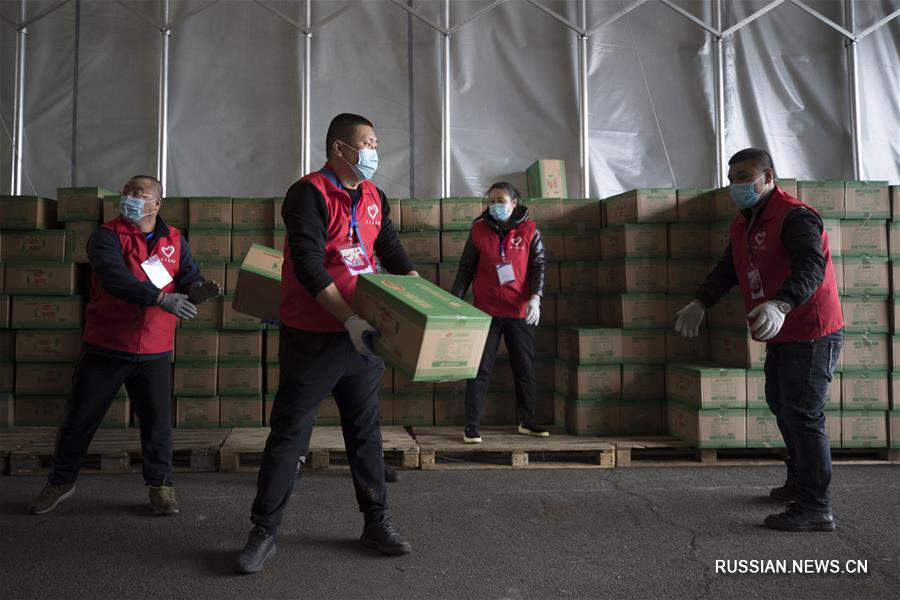 Ударная бригада волонтеров помогает бороться с эпидемией в Суйфэньхэ