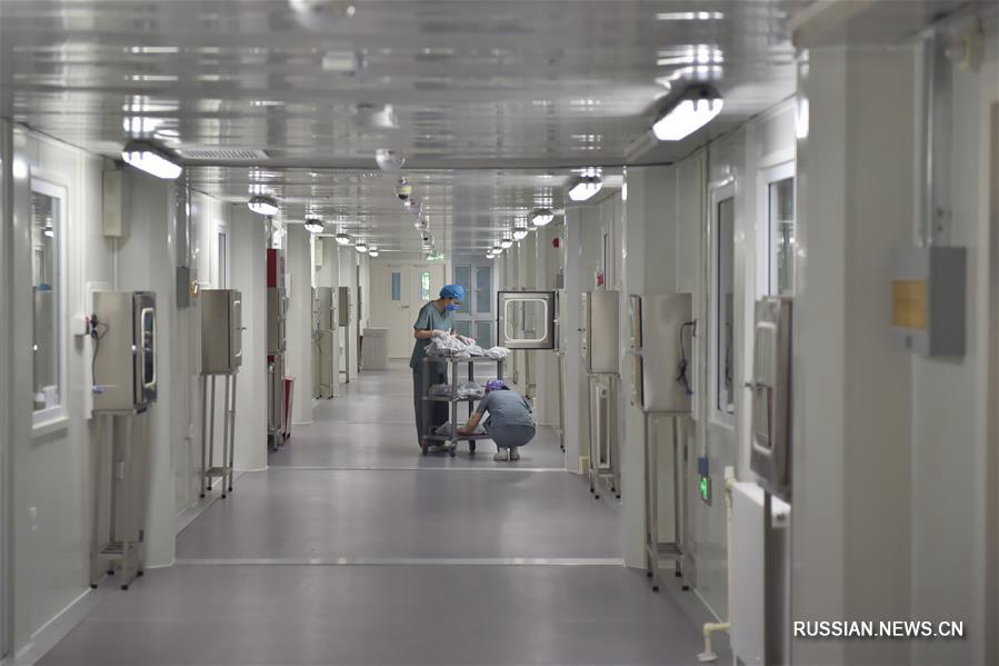 День в боксированном отделении пекинской больницы "Дитань"