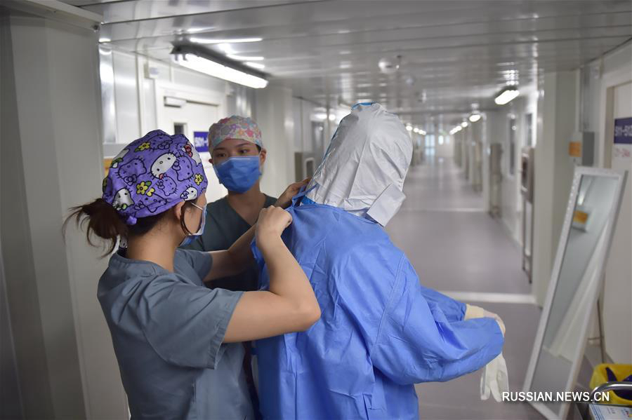 День в боксированном отделении пекинской больницы "Дитань"
