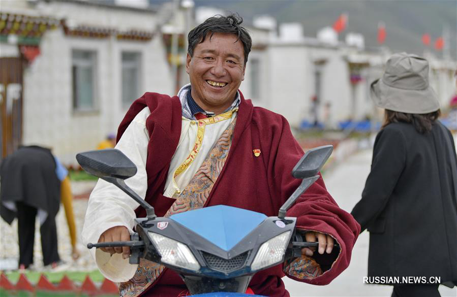 Переезд на новое место -- путь к среднезажиточному обществу в Тибетском АР 