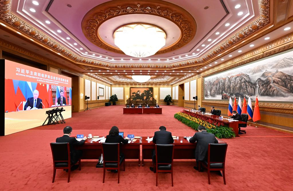 Председатель КНР Си Цзиньпин провел встречу с президентом РФ В. Путиным в формате видеоконференции