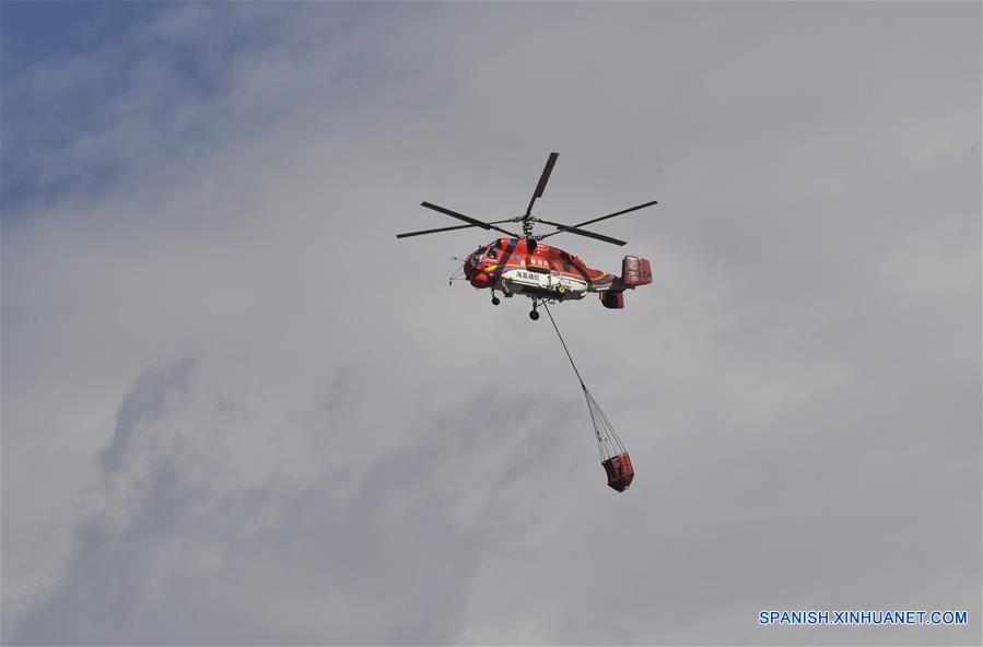 CHINA-SICHUAN-INCENDIO FORESTAL-HELICOPTERO