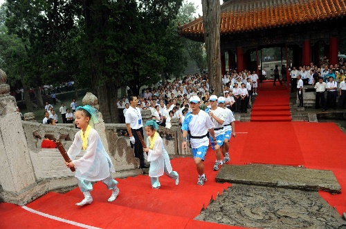 A launching ceremony is held in front of the Hall of Great Accomplishment in Qufu, Shandong Province July 22.