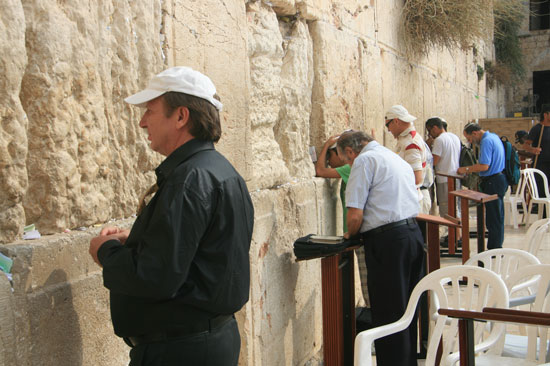People pray in front of the Western Wall in the Old City of Jerusalem 