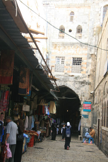 People walk through the streets of the Old City of Jerusalem 