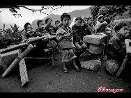 Some students have to walk five kilometers everyday to come to this school in poor conditions in rural Guizhou province. 