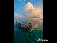  A mother and a son come back from fishing. The Bajau Laut, known as 'the Sea Gypsies,' live at the seaside of Malaysia and the Philippines. They build and live in tatty wooden sheds above the water and make a living by fishing. They have no access to education due to poverty and live on the margins of society.