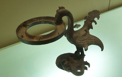 A bronze vessel showcased in museum.