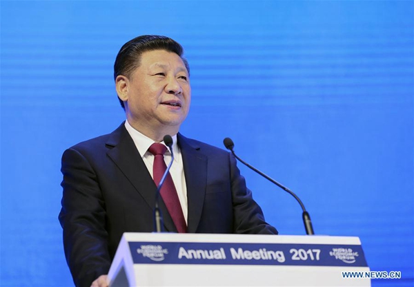 2017年1月17日，国家主席习近平在瑞士达沃斯国际会议中心出席世界经济论坛2017年年会开幕式，并发表题为《共担时代责任共促全球发展》的主旨演讲。 [新华社] Chinese President Xi Jinping delivers a keynote speech at the opening plenary of the 2017 annual meeting of the World Economic Forum in Davos, Switzerland, Jan. 17, 2017. [Photo/Xinhua]