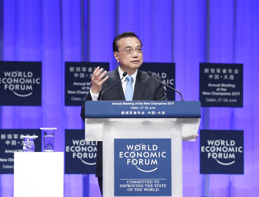 Chinese Premier Li Keqiang addresses the opening ceremony of the Annual Meeting of the New Champions 2017, or Summer Davos, in the city of Dalian, northeast China's Liaoning Province, June 27, 2017. [Photo/Xinhua]