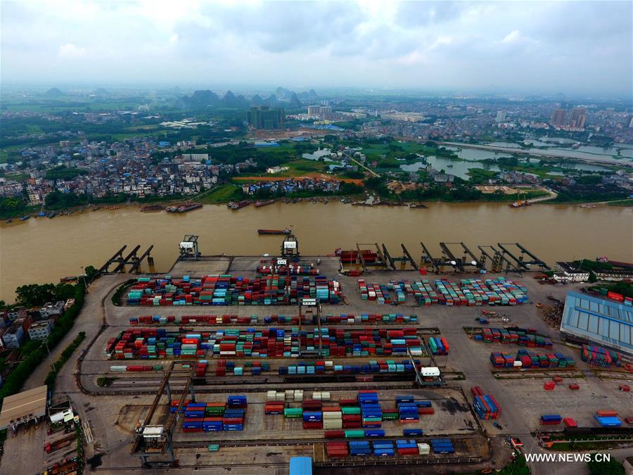 Photo taken on July 7, 2017 shows the Guigang port in south China&apos;s Guangxi Zhuang Autonomous Region. The throughput of Guigang Port in the first half of this year reached 29.8 million tons, up 12.4 percent year on year. [Photo/Xinhua]