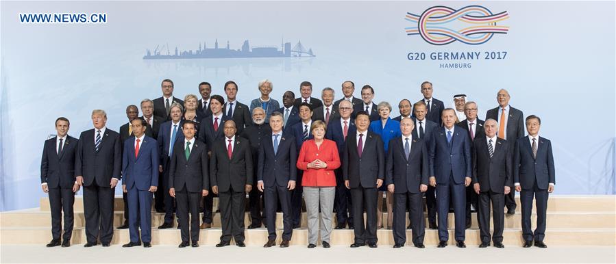 Chinese President Xi Jinping and other leaders attending the 12th Summit of the Group of 20 (G20) major economies pose for a group photo in Hamburg, Germany, July 7, 2017. [Photo/Xinhua]
